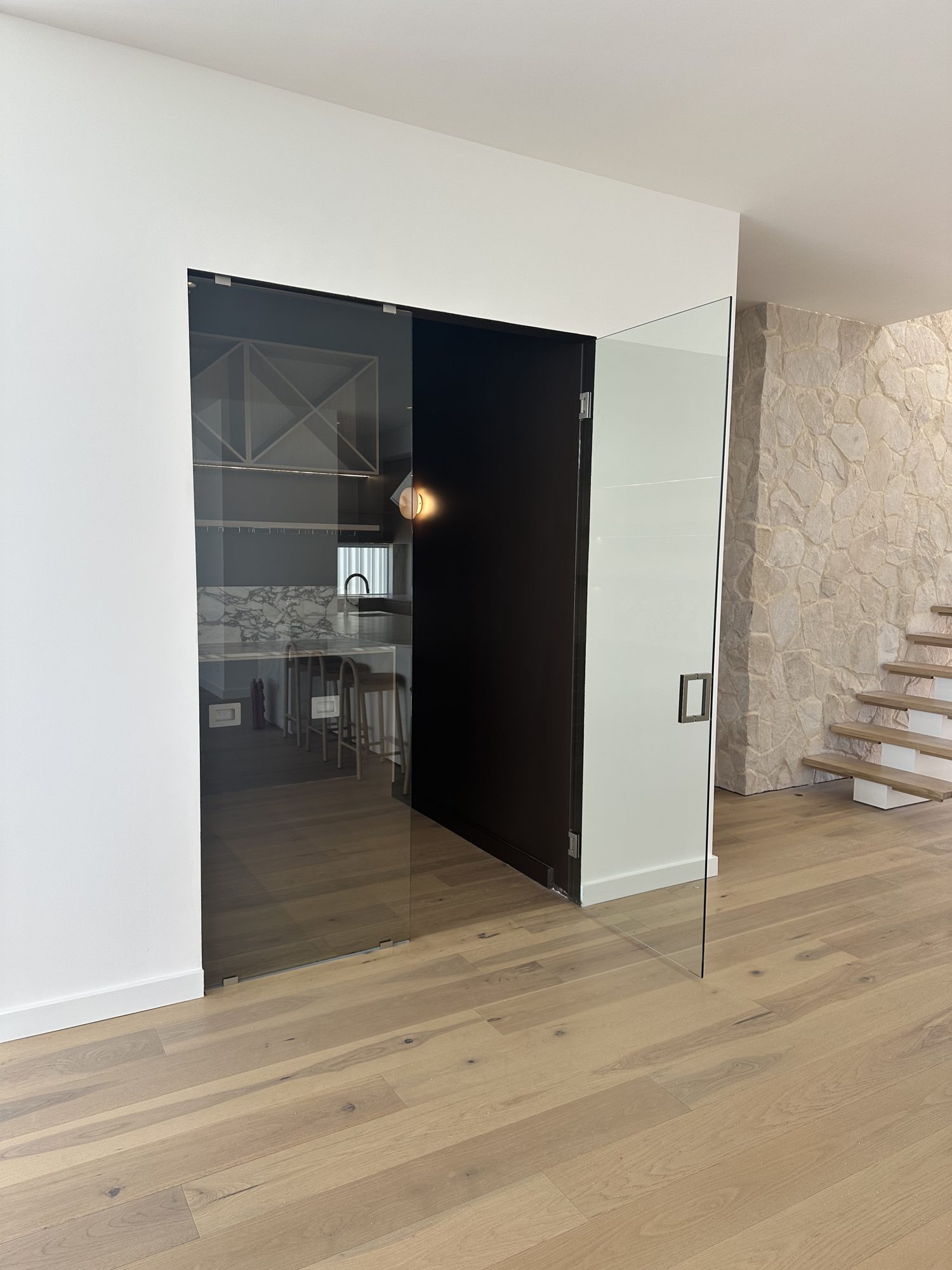 Frameless glass wine cellar doors — frameless glass structures Adelaide